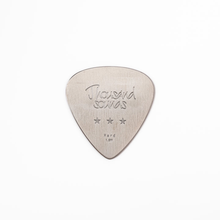 Unique guitar pick shaped stainless steel metal coaster engraved with thousand sounds text and stars