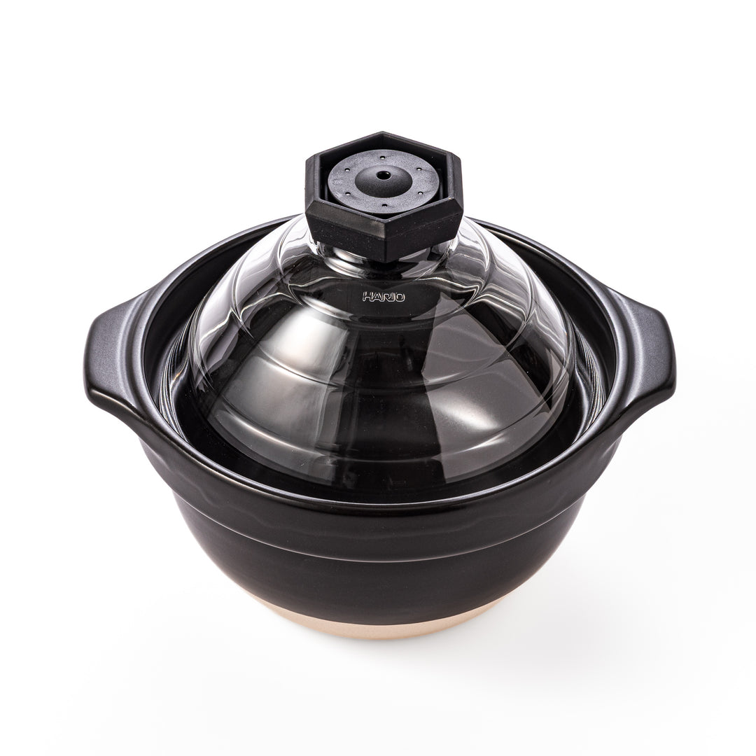 HARIO GohanGama ceramic rice cooker pot with a clear glass lid, designed for traditional Japanese stove top cooking