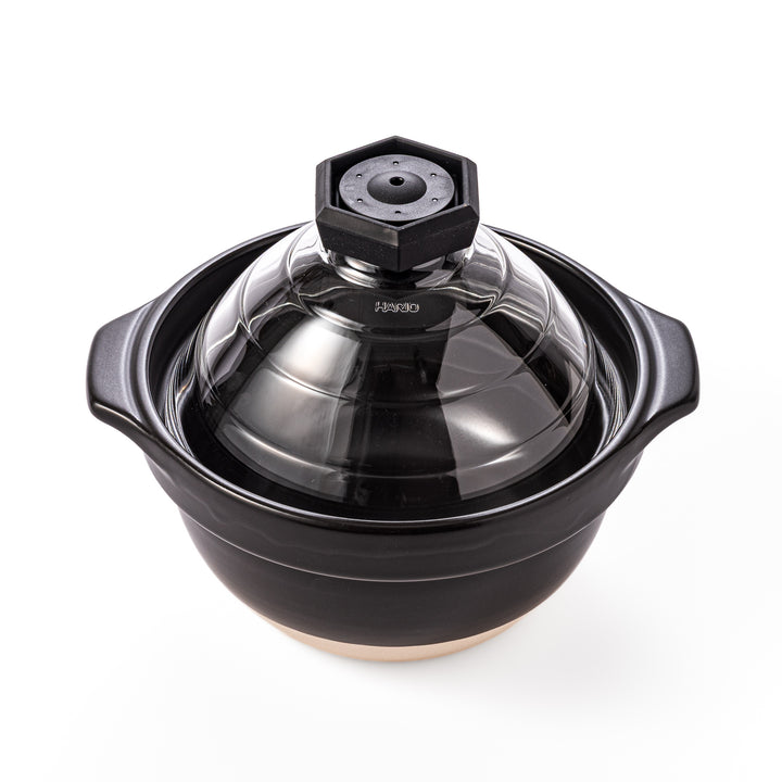 HARIO GohanGama ceramic rice cooker pot with a clear glass lid, designed for traditional Japanese stove top cooking