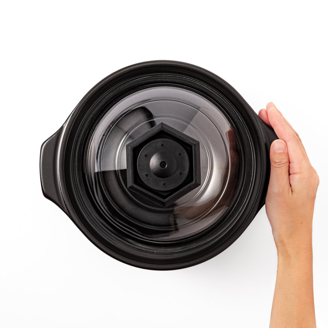HARIO GohanGama ceramic rice cooker pot with a clear glass lid, designed for traditional Japanese stove top cooking