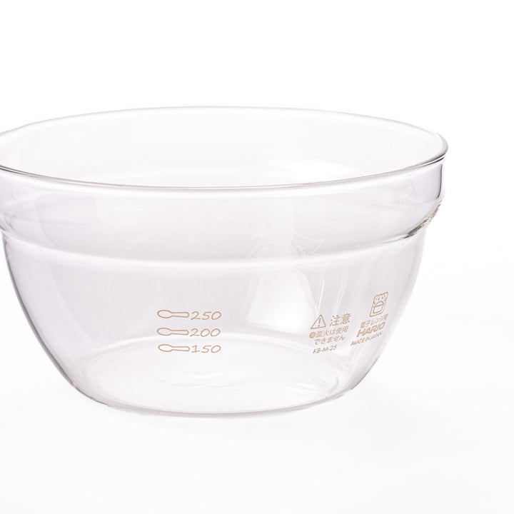 Set of four HARIO heat resistant glass mixing bowls with pour spouts, featuring various nested sizes for easy meal prep