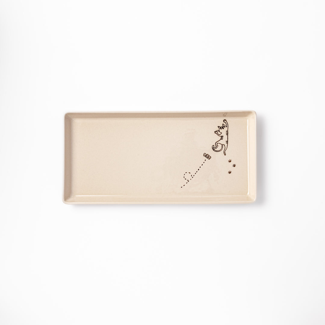 Beige rectangular ceramic plate featuring a playful tabby cat illustration with paw prints and a butterfly in the corner.