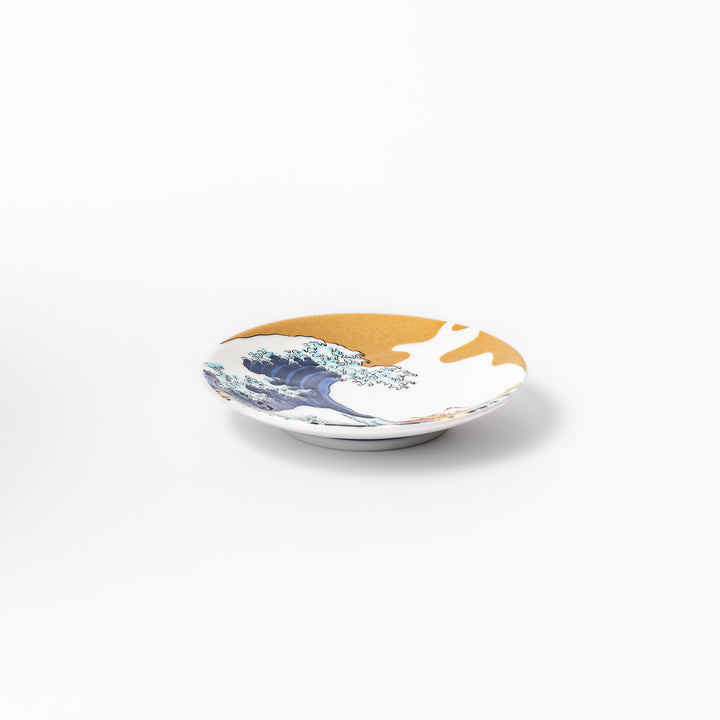 Round Japanese ceramic sauce dish featuring Hokusai’s Great Wave design with vivid blue waves, golden sky, and Mt. Fuji, perfect for soy sauce or condiments.