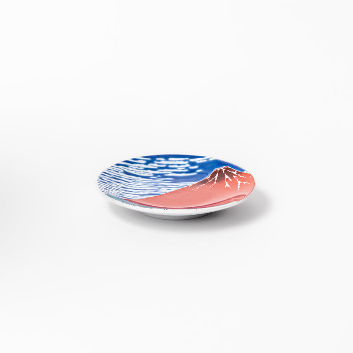 Round Japanese ceramic sauce dish featuring Hokusai’s iconic Red Fuji design with vivid red mountain, blue sky, and clouds, perfect for soy sauce or condiments.
