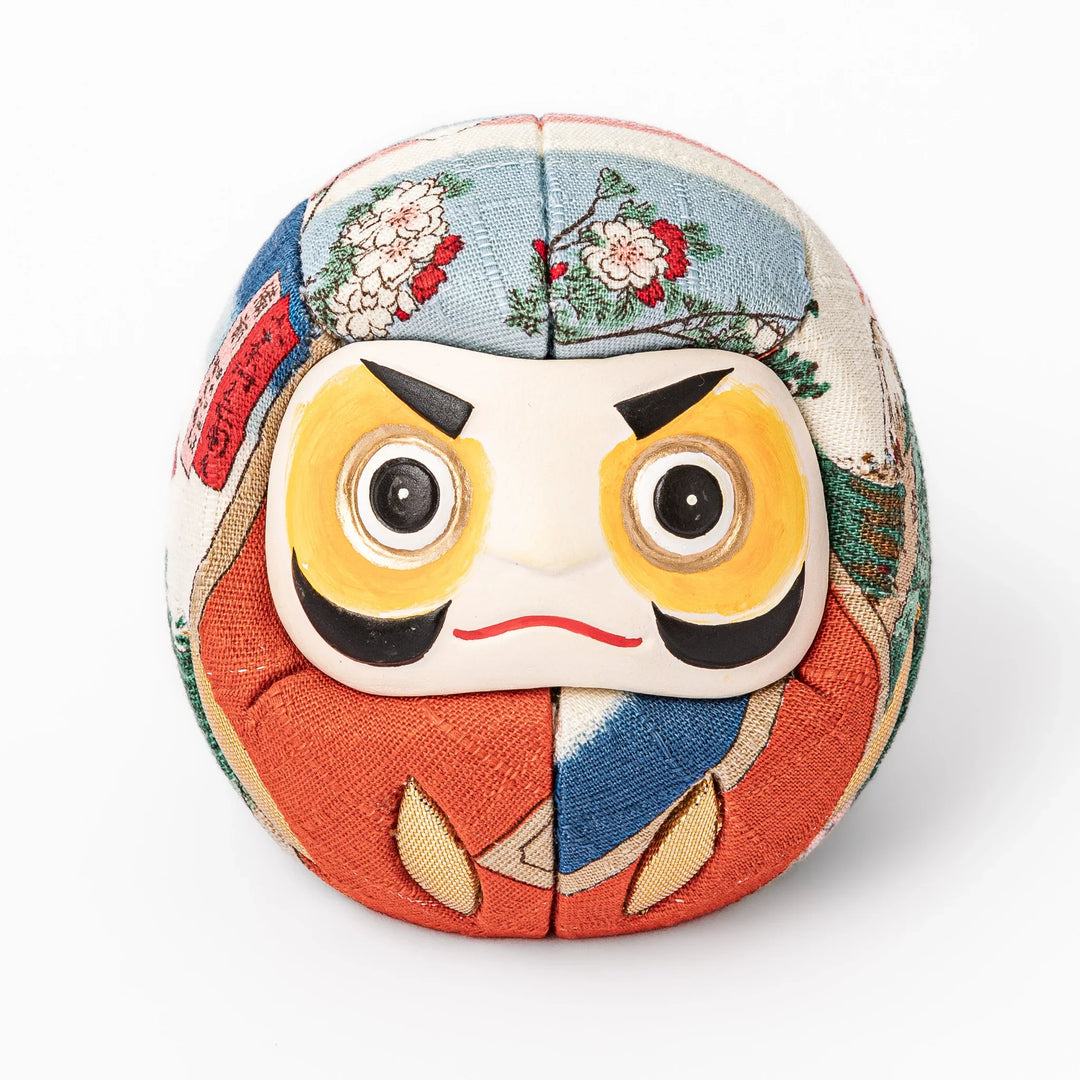 Fabric daruma ornament with bright multicolor kimono pattern and bold painted face
