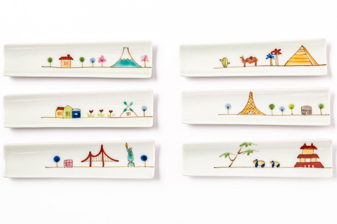 Colorful porcelain chopstick rests featuring charming hand-painted world landmarks and scenes.
