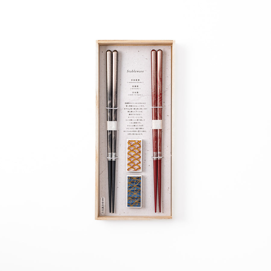 Elegant Bloom Japanese chopsticks gift set inside a traditional wooden box featuring two pairs of chopsticks and matching rests