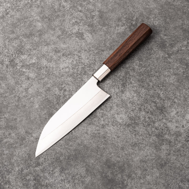 Elegant Japanese kitchen knife with cherry blossom cutout pattern on the blade, featuring a sharp edge and dark wooden handle for precise cutting.