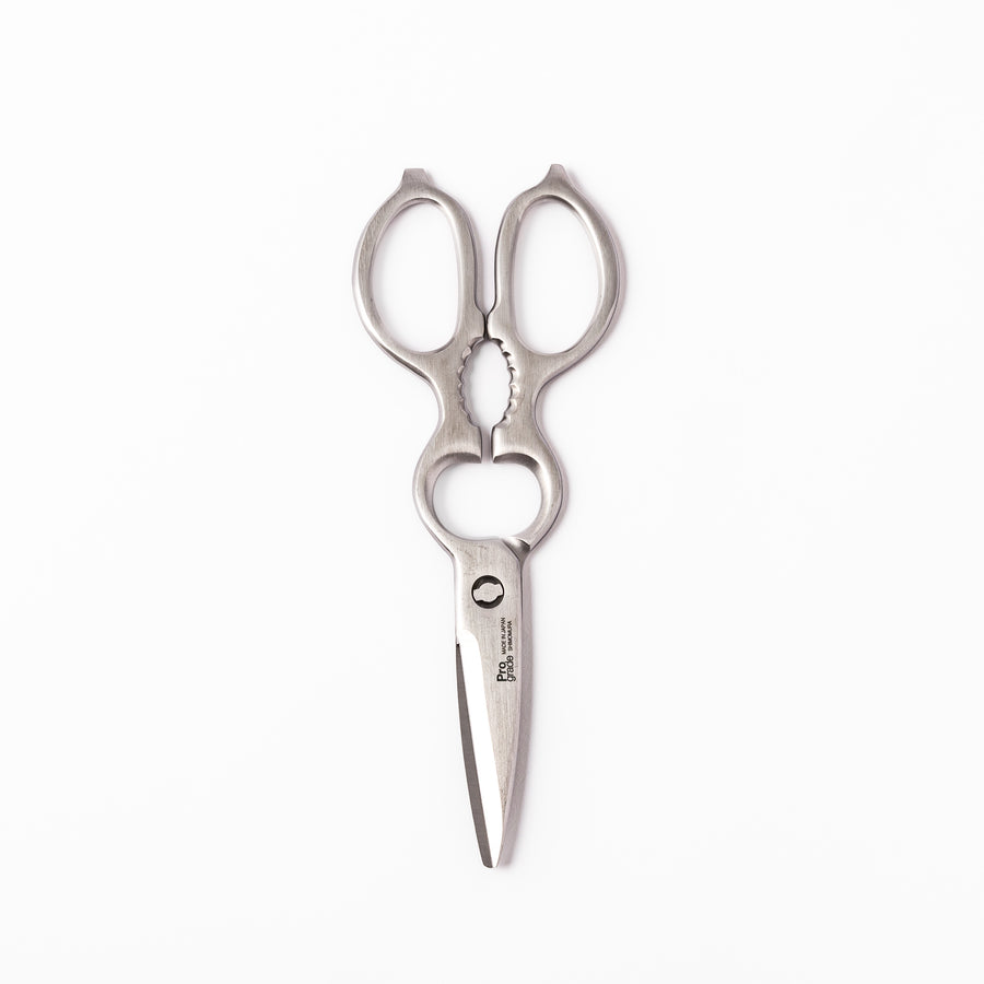 Japanese all-stainless multi-purpose kitchen shears with sharp blades and built-in grip, ideal for cutting meat, seafood, and vegetables with precision and ease.