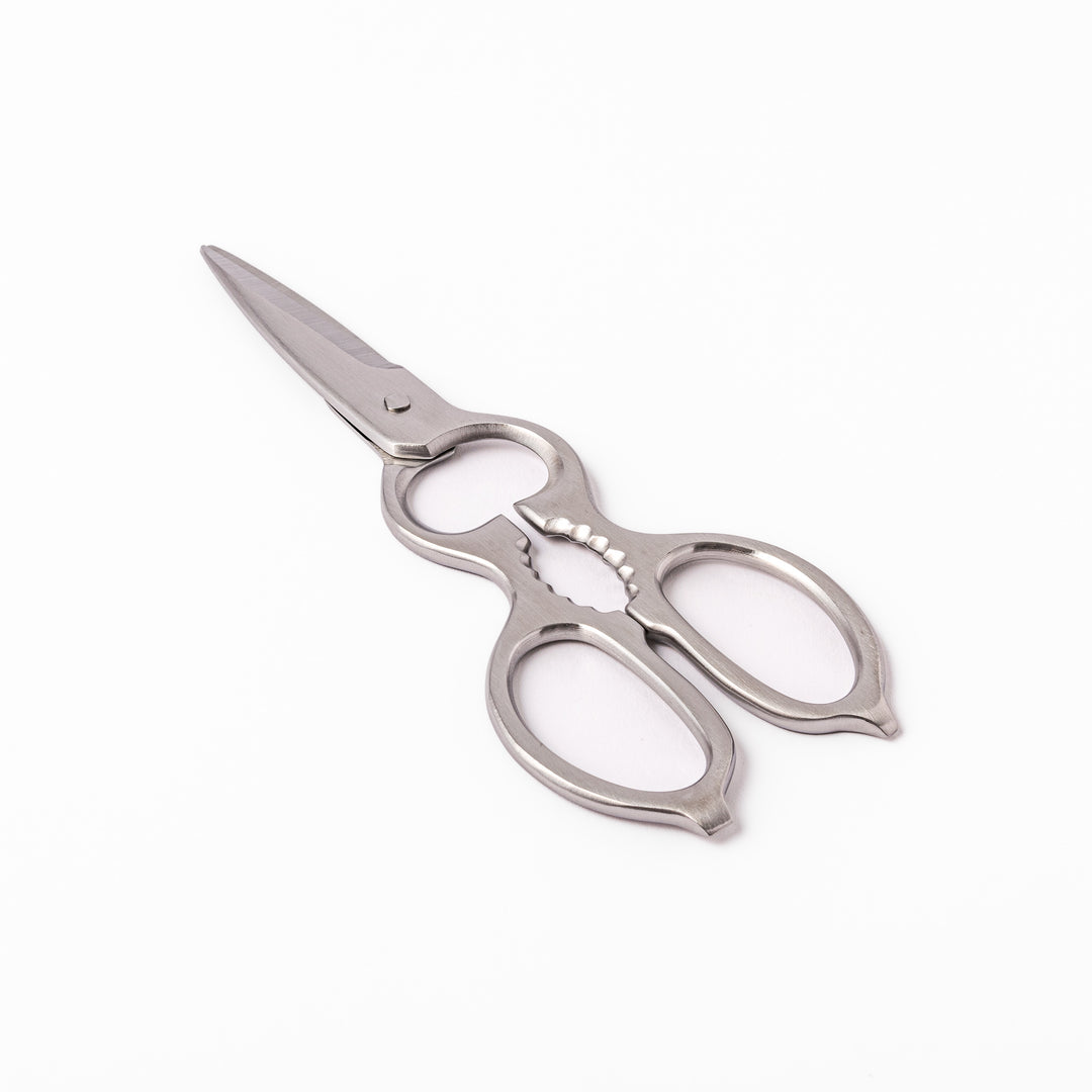 Japanese all-stainless multi-purpose kitchen shears with sharp blades and built-in grip, ideal for cutting meat, seafood, and vegetables with precision and ease.