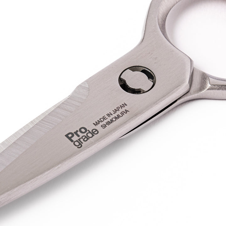 Japanese all-stainless multi-purpose kitchen shears with sharp blades and built-in grip, ideal for cutting meat, seafood, and vegetables with precision and ease.