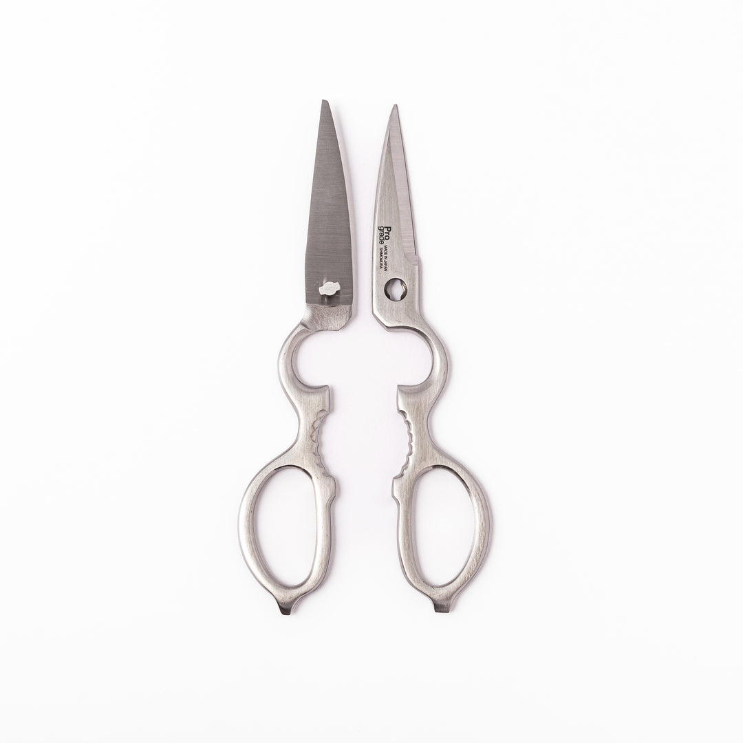 Japanese all-stainless multi-purpose kitchen shears with sharp blades and built-in grip, ideal for cutting meat, seafood, and vegetables with precision and ease.