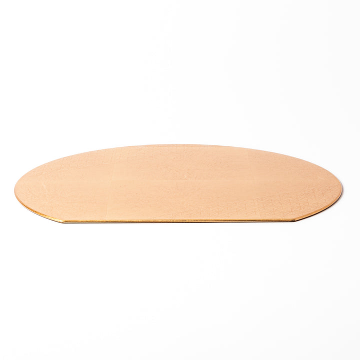 Gold Japanese Asanoha Hemp Leaf Placemat with a semi-circular shape and embossed pattern, ideal for elegant table settings and refined seasonal presentation.
