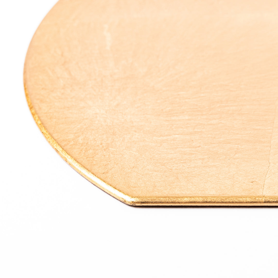 Gold Japanese Asanoha Hemp Leaf Placemat with a semi-circular shape and embossed pattern, ideal for elegant table settings and refined seasonal presentation.