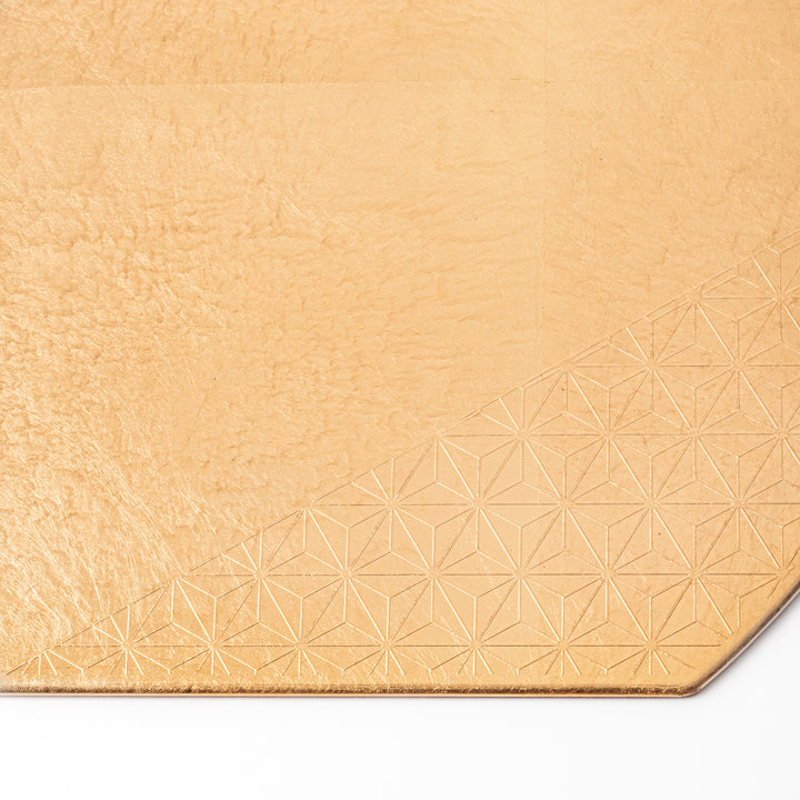 Gold Japanese Asanoha Hemp Leaf Placemat with a semi-circular shape and embossed pattern, ideal for elegant table settings and refined seasonal presentation.
