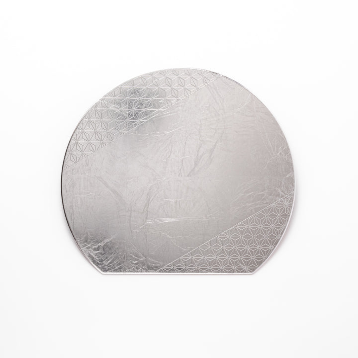Silver Japanese Asanoha Hemp Leaf Placemat with a semi-circular shape and embossed geometric pattern, perfect for refined modern or traditional table settings.
