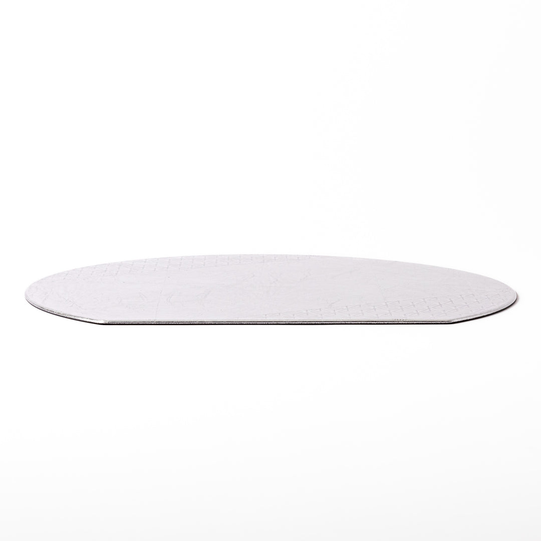 Silver Japanese Asanoha Hemp Leaf Placemat with a semi-circular shape and embossed geometric pattern, perfect for refined modern or traditional table settings.