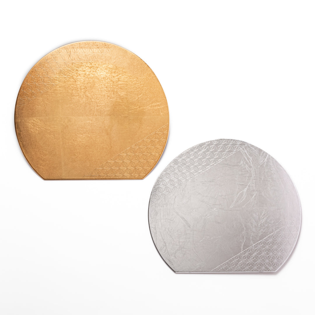 Japanese Asanoha Hemp Leaf Placemats in gold and silver, featuring a semi-circular shape and embossed pattern, perfect for modern and elegant table settings.
