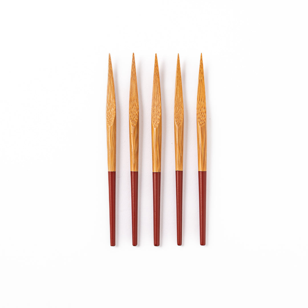 Set of five Japanese bamboo cocktail forks with red handles and a natural bamboo finish for appetizers and desserts