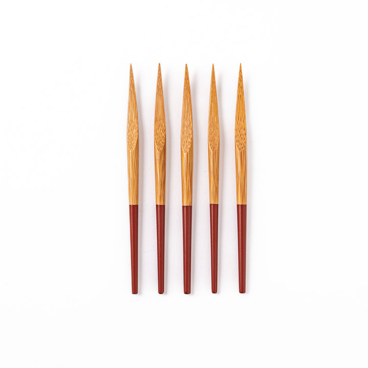 Set of five Japanese bamboo cocktail forks with red handles and a natural bamboo finish for appetizers and desserts