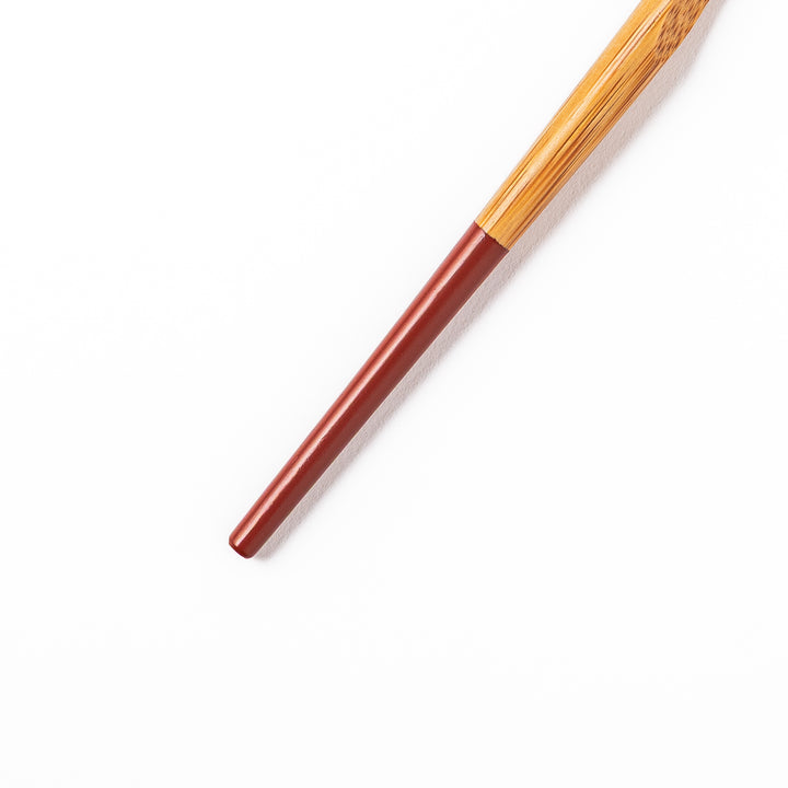 Set of five Japanese bamboo cocktail forks with red handles and a natural bamboo finish for appetizers and desserts