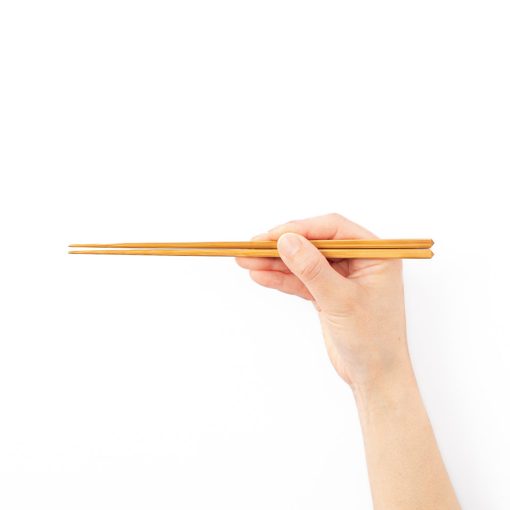 Authentic Japanese fine tip bamboo chopsticks with a natural bamboo finish for precise dining and minimalist table settings