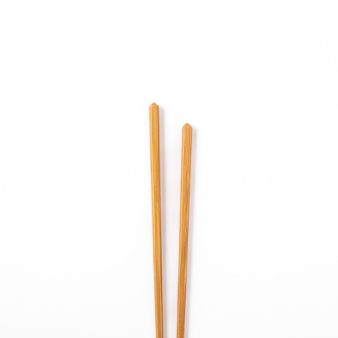 Authentic Japanese fine tip bamboo chopsticks with a natural bamboo finish for precise dining and minimalist table settings