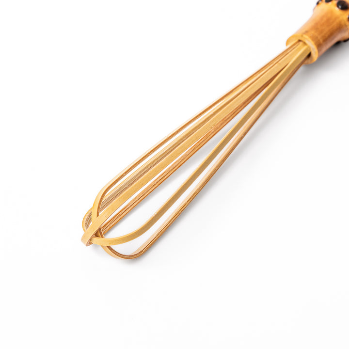 Japanese bamboo mini whisk with a natural root handle for whipping small portions of dressings or matcha