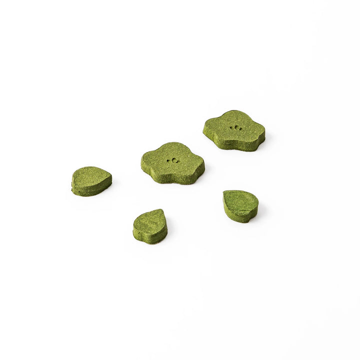 Japanese matcha pressed incense pieces in floral and leaf shapes, green scented incense for relaxation and home fragrance