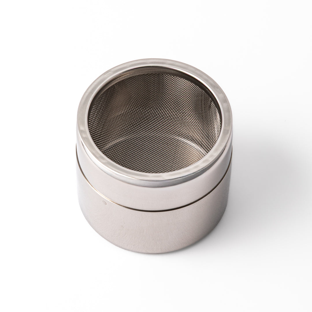 A Japanese stainless steel matcha sifter canister set with a fine mesh strainer scoop and sifting rings for smooth matcha powder