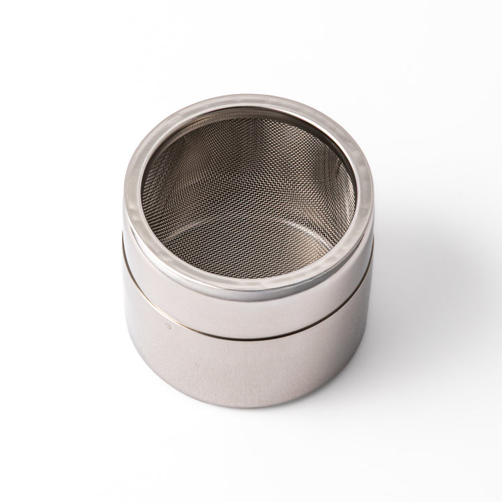 A Japanese stainless steel matcha sifter canister set with a fine mesh strainer scoop and sifting rings for smooth matcha powder