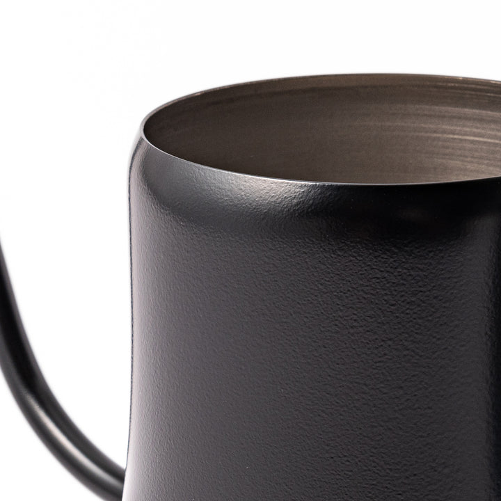 Japanese matte black precision pour kettle with a slender gooseneck spout and ergonomic handle, designed for controlled water flow in pour-over coffee brewing.