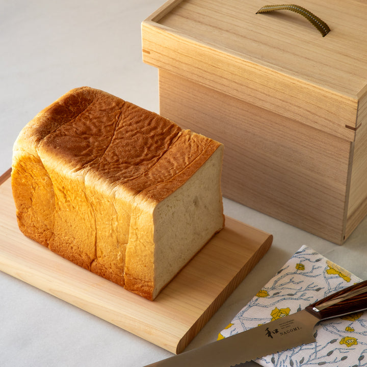 Japanese Paulownia Wood Bread Storage Box 1.5 Loaf size paired with artisan bread and kitchen accessories   