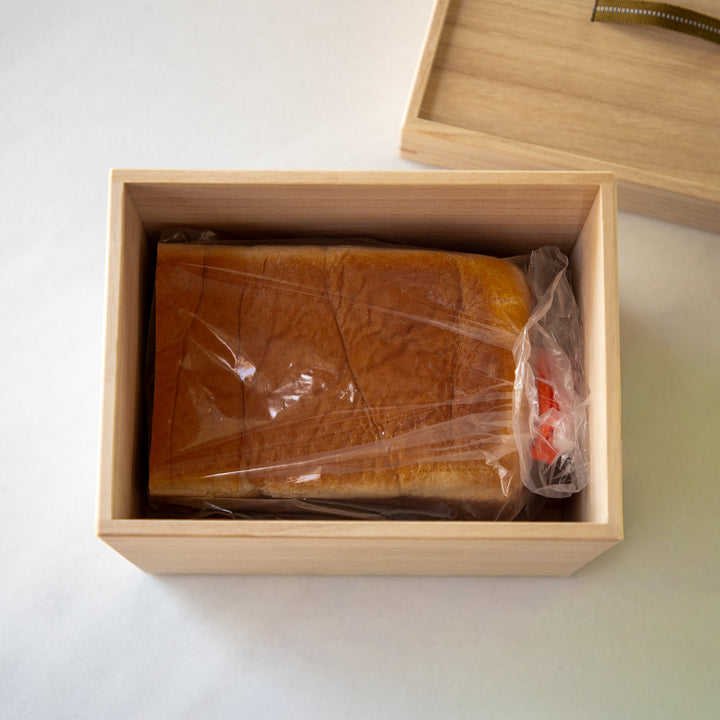 Japanese Paulownia Wood Bread Storage Box 1.5 Loaf size with bread loaf stored inside wooden container   