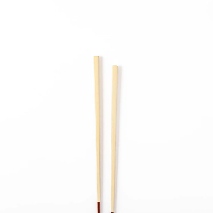 Pair of natural white Japanese traditional color bamboo chopsticks with fine tips for an elegant and precise dining experience