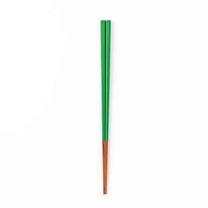 Pair of evergreen green Japanese traditional color bamboo chopsticks with fine tips for an elegant and precise dining experience