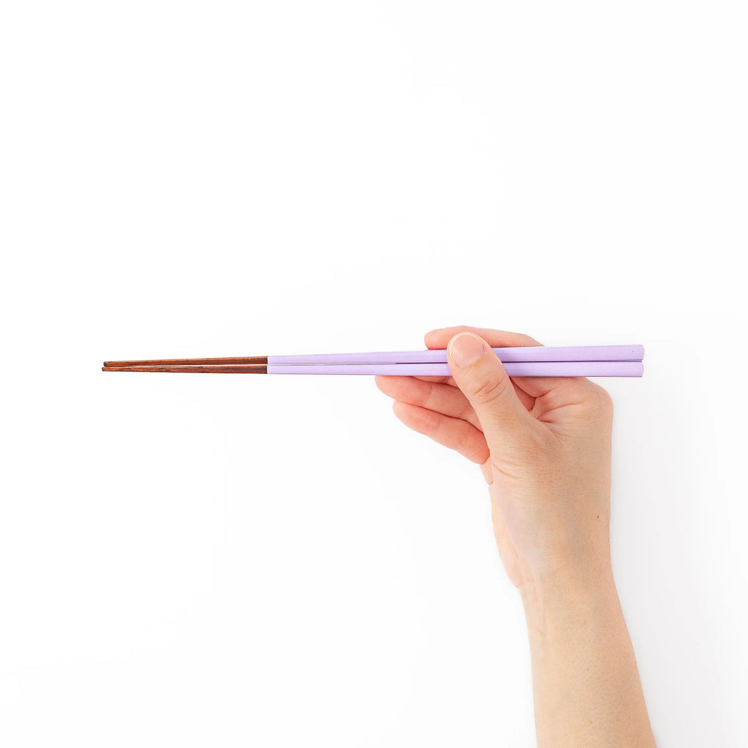Pair of wisteria purple Japanese traditional color bamboo chopsticks with fine tips for an elegant and precise dining experience