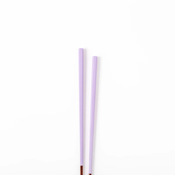 Pair of wisteria purple Japanese traditional color bamboo chopsticks with fine tips for an elegant and precise dining experience
