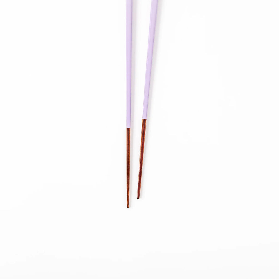 Pair of wisteria purple Japanese traditional color bamboo chopsticks with fine tips for an elegant and precise dining experience