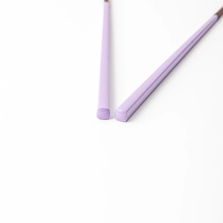 Pair of wisteria purple Japanese traditional color bamboo chopsticks with fine tips for an elegant and precise dining experience