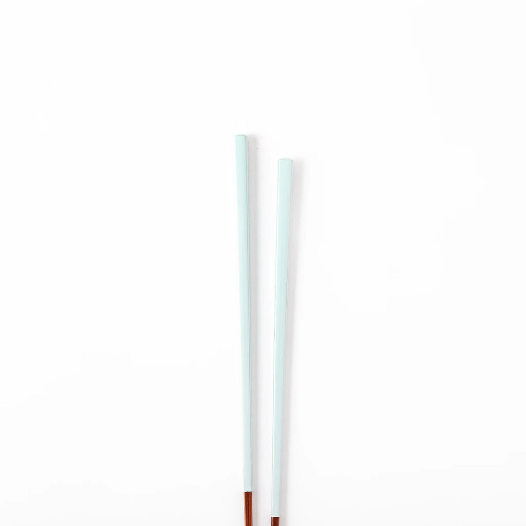 Pair of misty blue Japanese traditional color bamboo chopsticks with fine tips for an elegant and precise dining experience