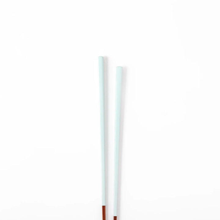 Pair of misty blue Japanese traditional color bamboo chopsticks with fine tips for an elegant and precise dining experience