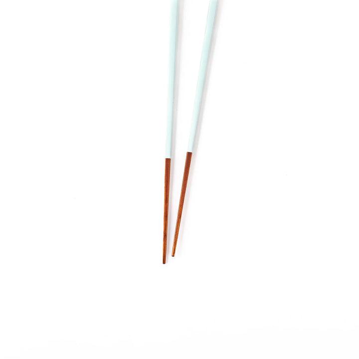 Pair of misty blue Japanese traditional color bamboo chopsticks with fine tips for an elegant and precise dining experience
