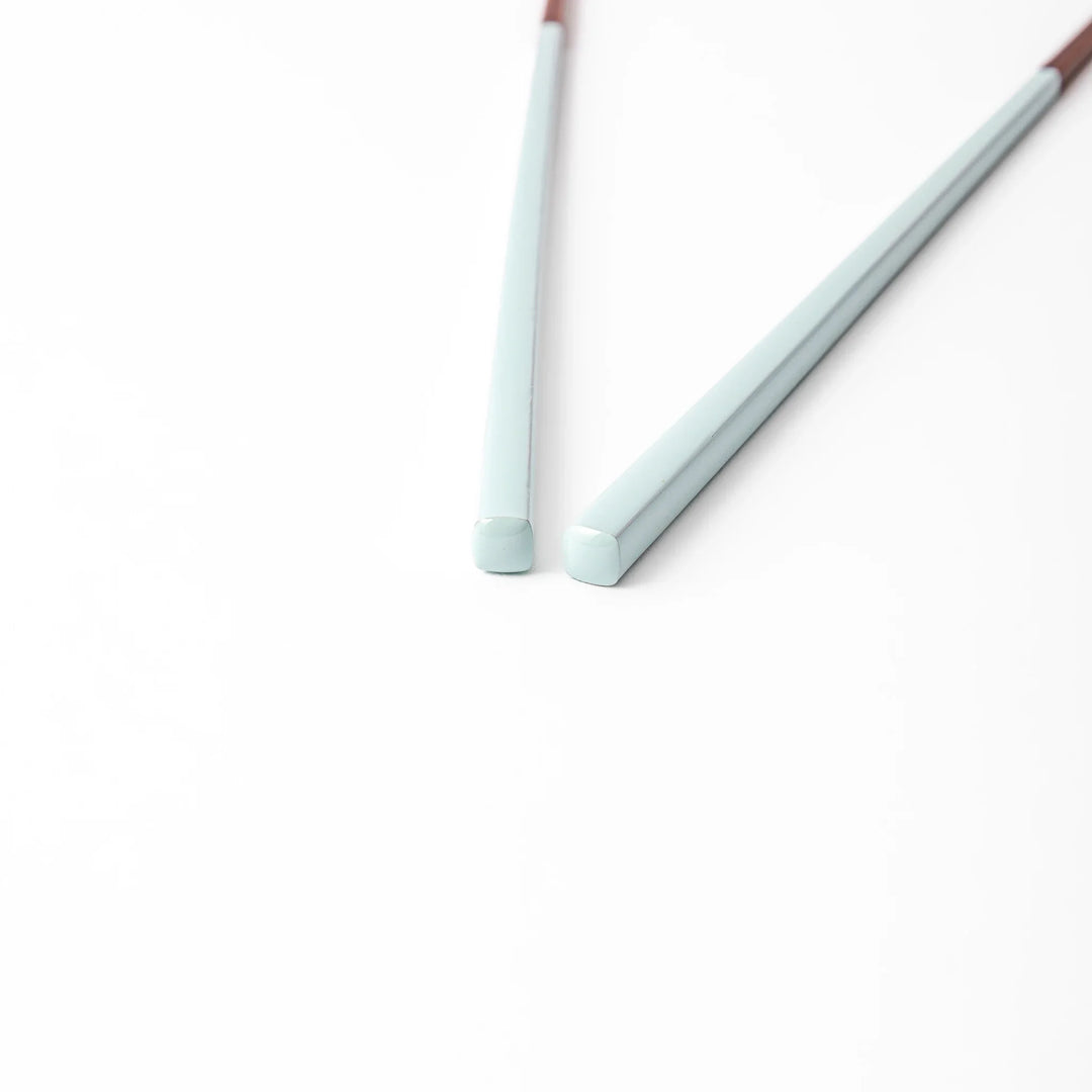 Pair of misty blue Japanese traditional color bamboo chopsticks with fine tips for an elegant and precise dining experience
