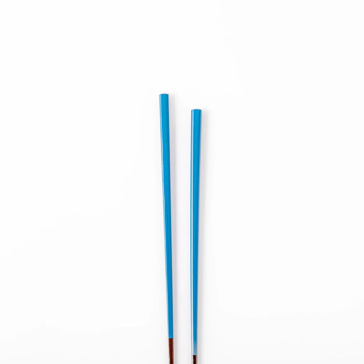 Pair of azure blue Japanese traditional color bamboo chopsticks with fine tips for an elegant and precise dining experience