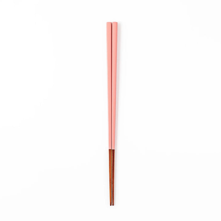 Pair of peach blossom pink Japanese traditional color bamboo chopsticks with fine tips for an elegant and precise dining experience