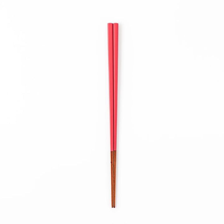 Pair of deep crimson Japanese traditional color bamboo chopsticks with fine tips for an elegant and precise dining experience