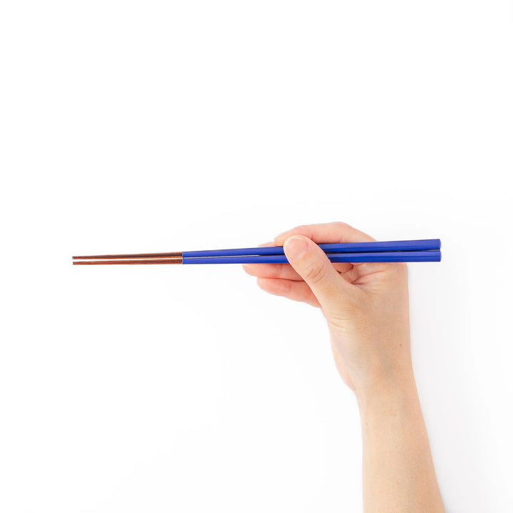 Pair of cobalt blue Japanese traditional color bamboo chopsticks with fine tips for an elegant and precise dining experience