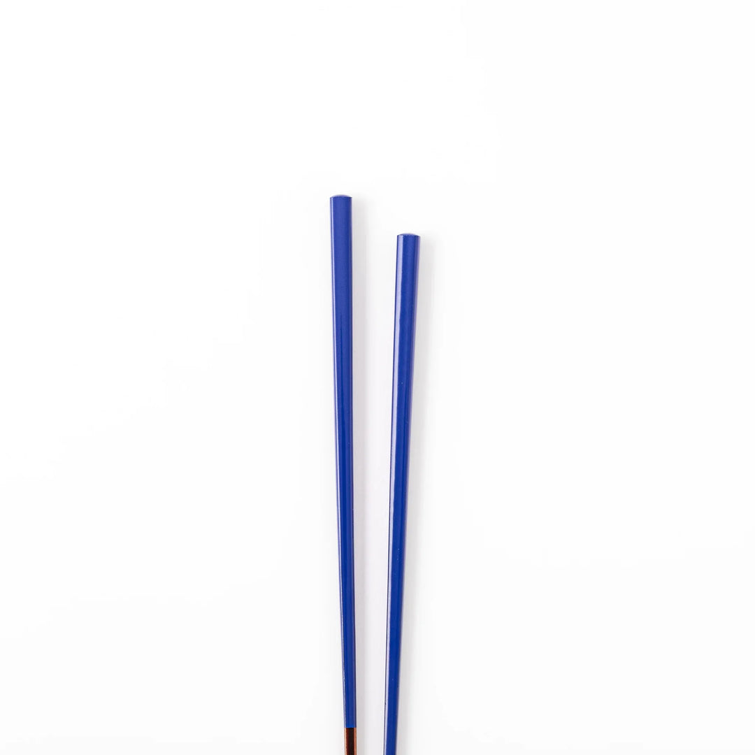 Pair of cobalt blue Japanese traditional color bamboo chopsticks with fine tips for an elegant and precise dining experience
