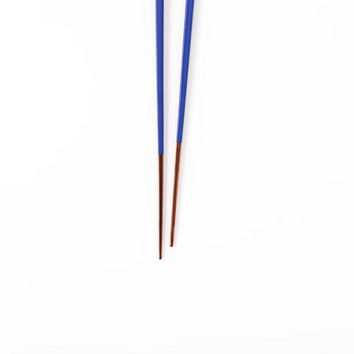 Pair of cobalt blue Japanese traditional color bamboo chopsticks with fine tips for an elegant and precise dining experience